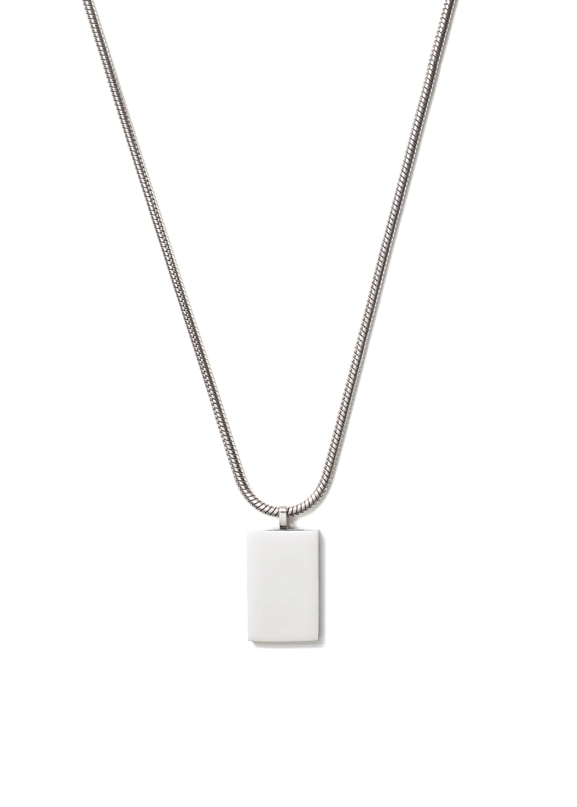 Backside of caltian stainless steel 2mm snake necklace with wide pendant on white background