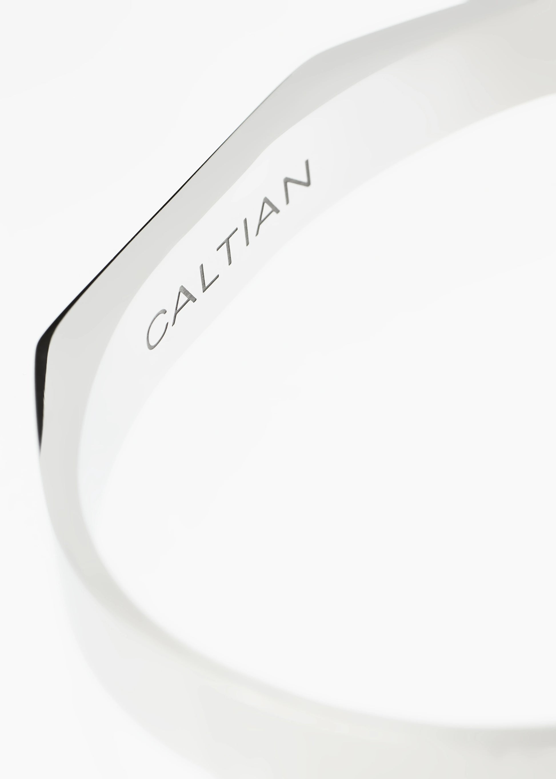 Close-up of Caltian stainless steel signet cuff bracelet mens jewelry logo